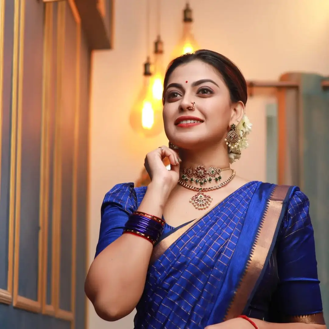 Anusree Nair Wearing Beautiful Earrings Jewellery Blue Saree